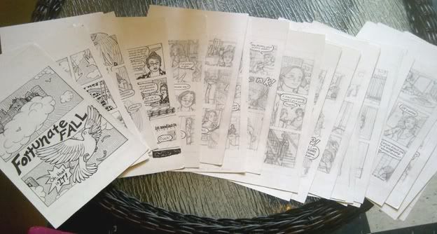 a photo of 24 spread-out pages of comics, some inked and some just penciled