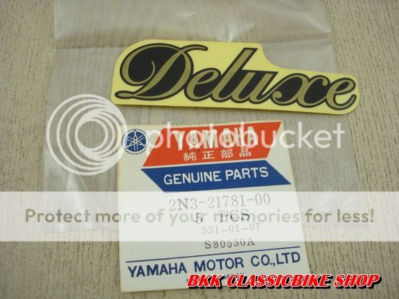 P//N 2N3-21781-00 GENUINE NOS YAMAHA DELUXE  DX100 YB100 Sticker side cover